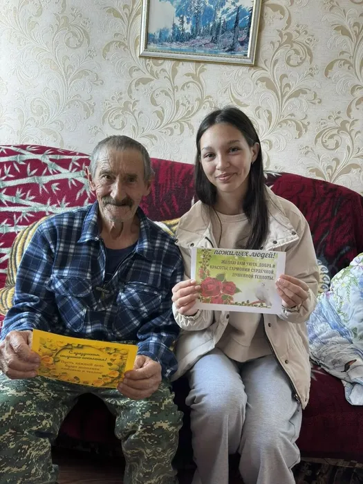 Участник акции Понамарев Г.В с волонтером