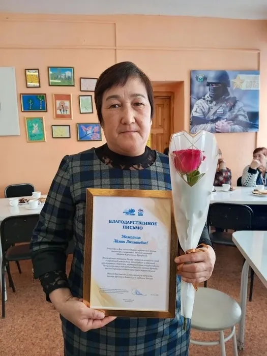 Айман Исенова